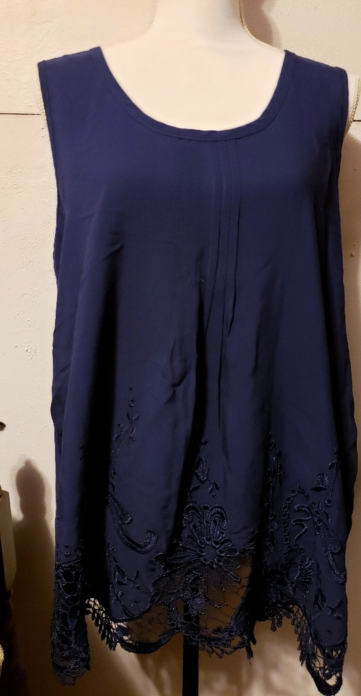 Blue tunic embroidered hem